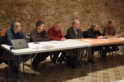 Participants seguint el debat en una trobada dels inicis de la comunitat